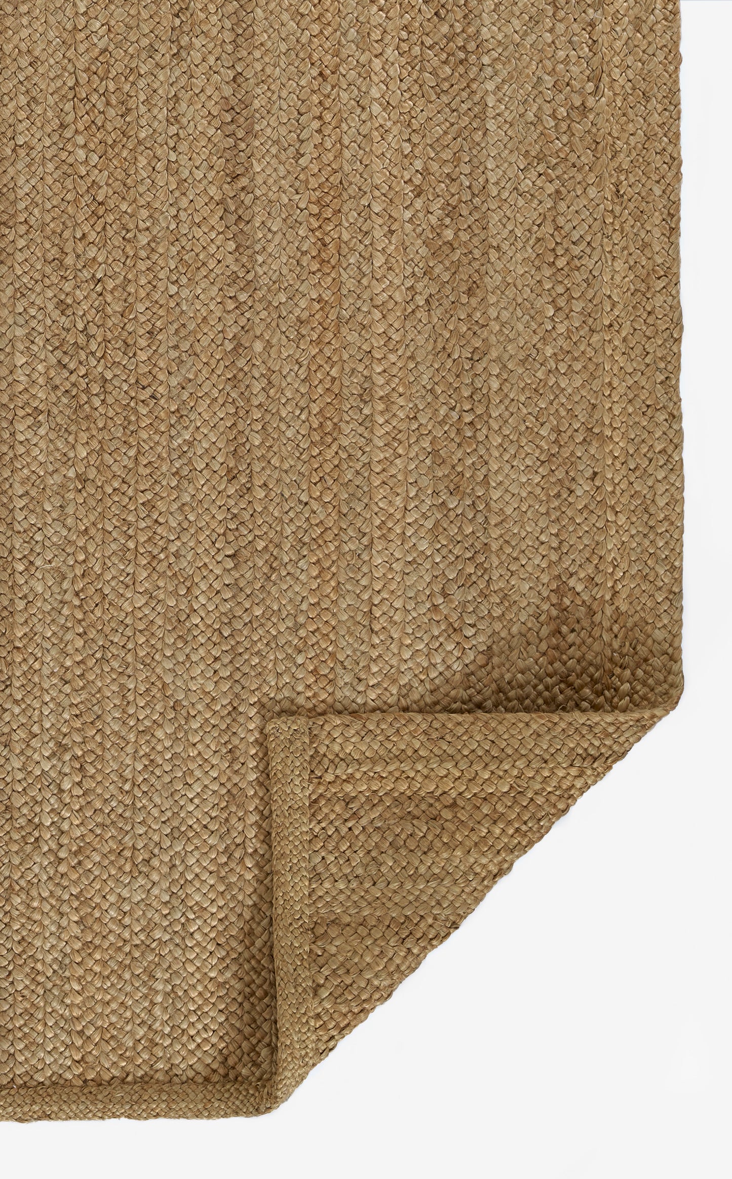 Natural beige jute runner with a thick braided texture and folded corner (2'6" x 8').