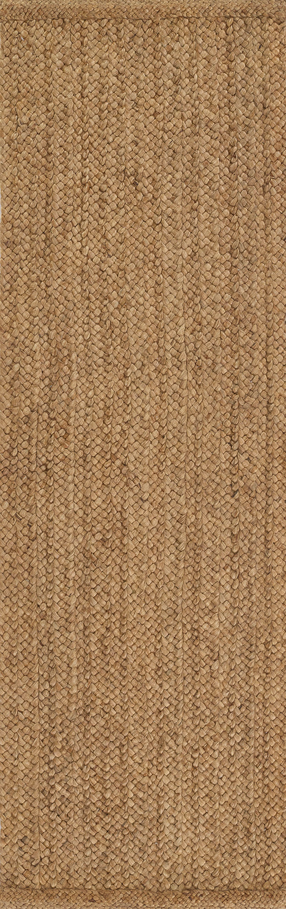Natural jute rug with braided rope-like weave in warm tan.
