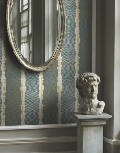 York Lemieux et Cie CE3961 Indigenous teal stripe wallpaper on feature wall, styled with brass accents and cream furnishing — luxury teal striped wallcovering for modern and eclectic interiors.