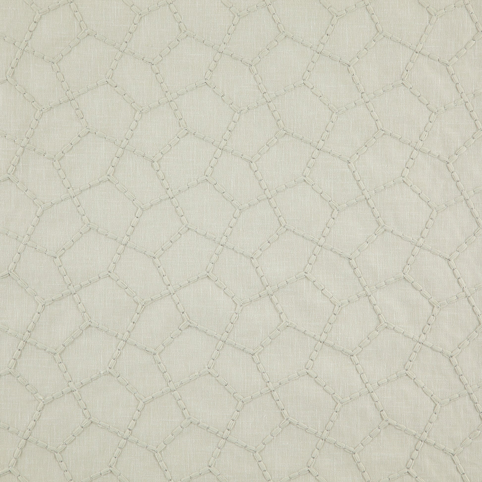 Metallic yellow/gold fabric with a geometric hexagonal lattice pattern and subtle quilted texture.