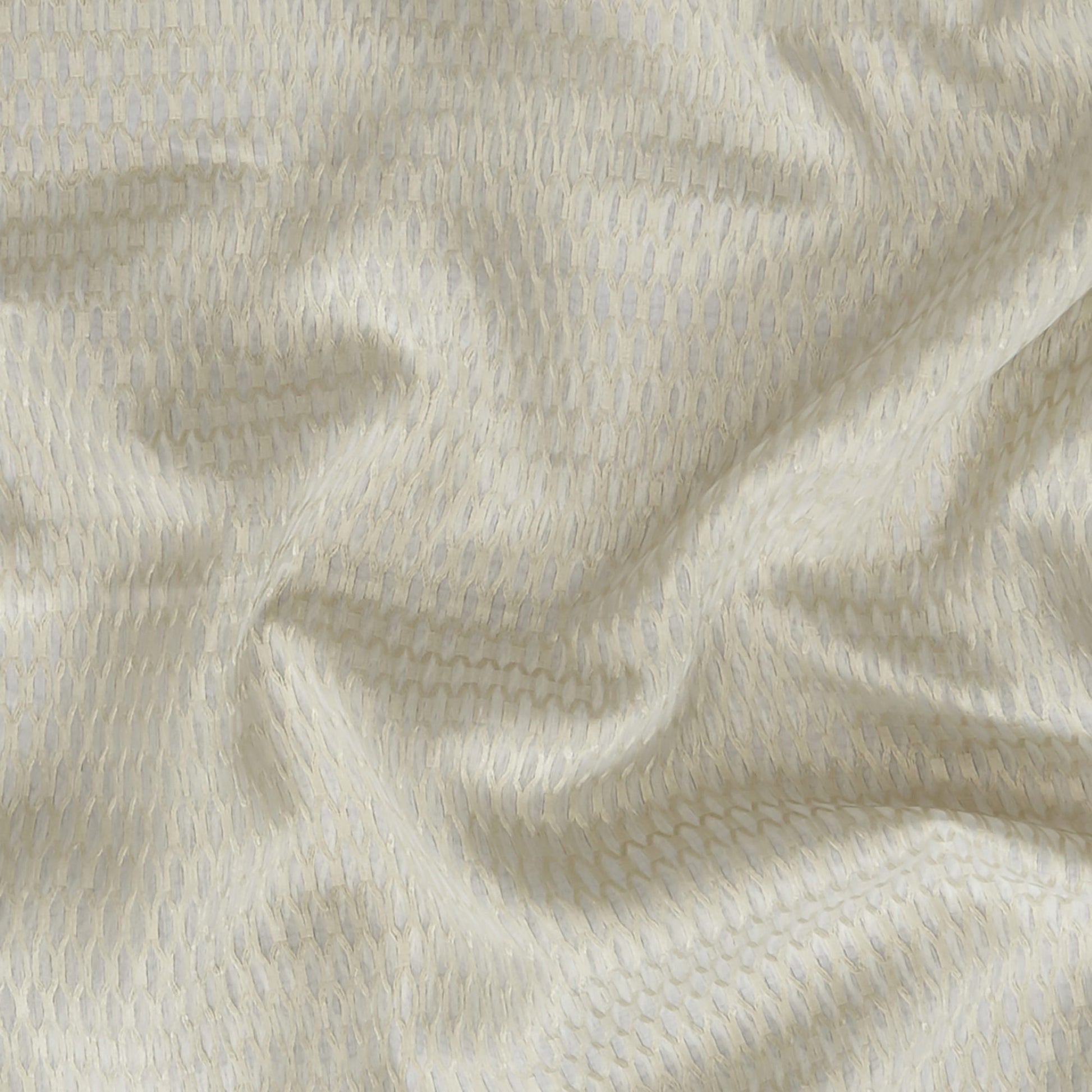 Geometric green sheer fabric with a fine weave; wide width.
