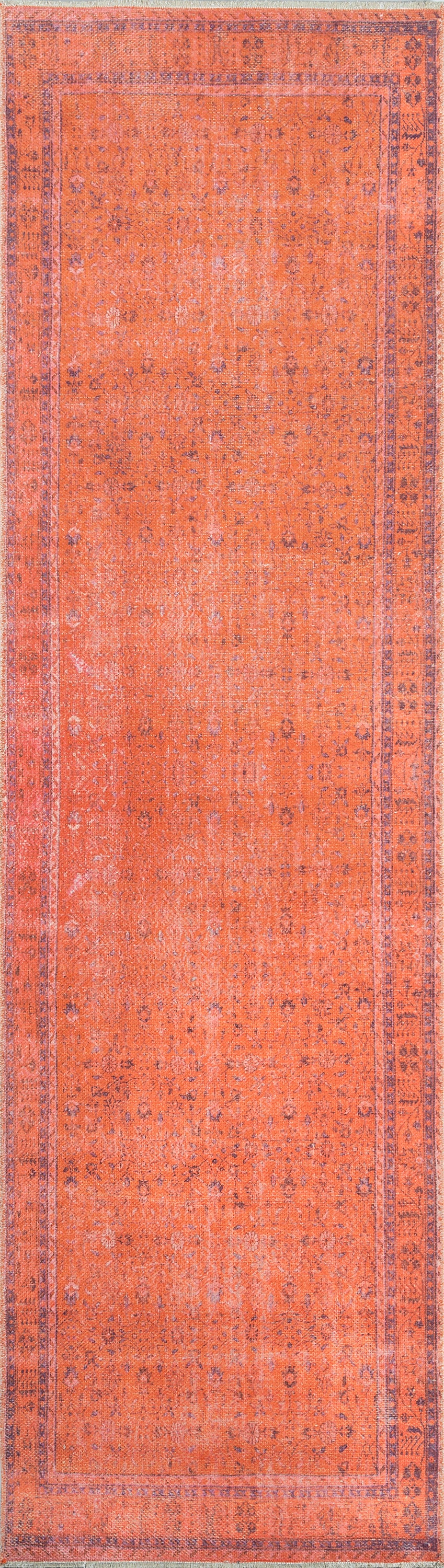Orange Persian-inspired rug with a blue border and faded, distressed floral motifs.