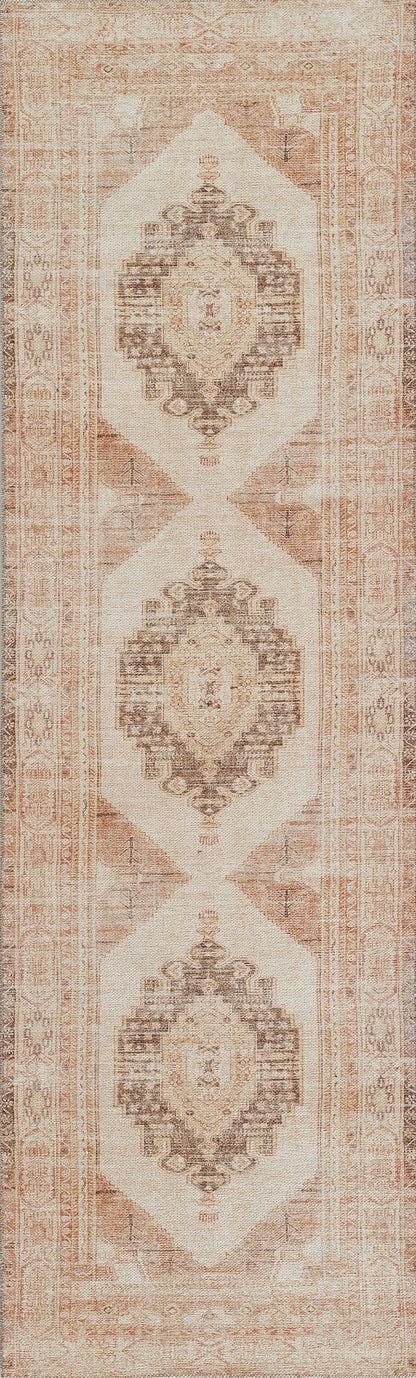 Distressed cream oriental rug with peach-brown diamond medallions.