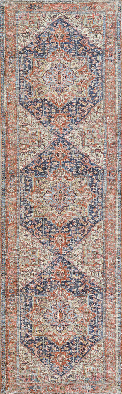 Rectangular oriental area rug with navy and coral diamond medallions, ivory field, and an ornate floral border.