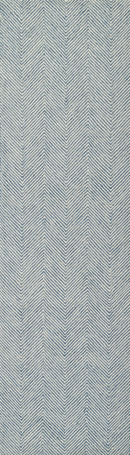 Blue and off-white chevron herringbone woven fabric texture.