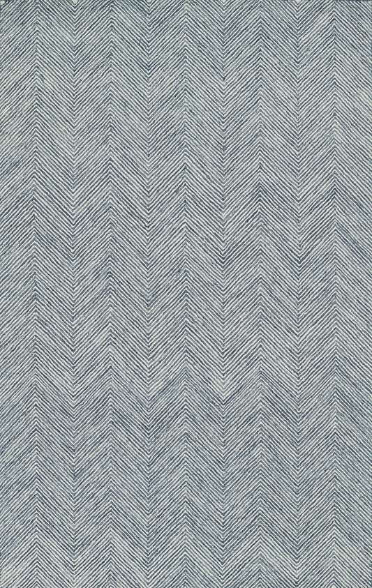 Blue-gray herringbone chevron fabric texture with woven denim-like threads.