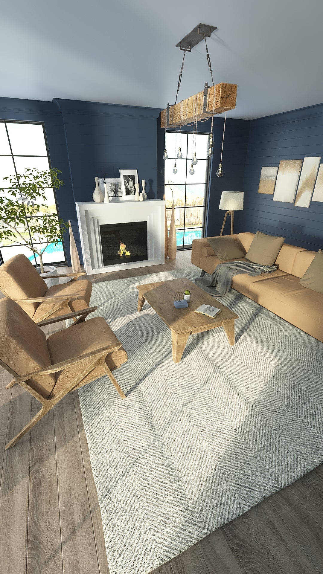 Cozy living room with blue walls, tan sofa & chairs, wooden coffee table, gray chevron rug, fireplace, hanging chandelier.