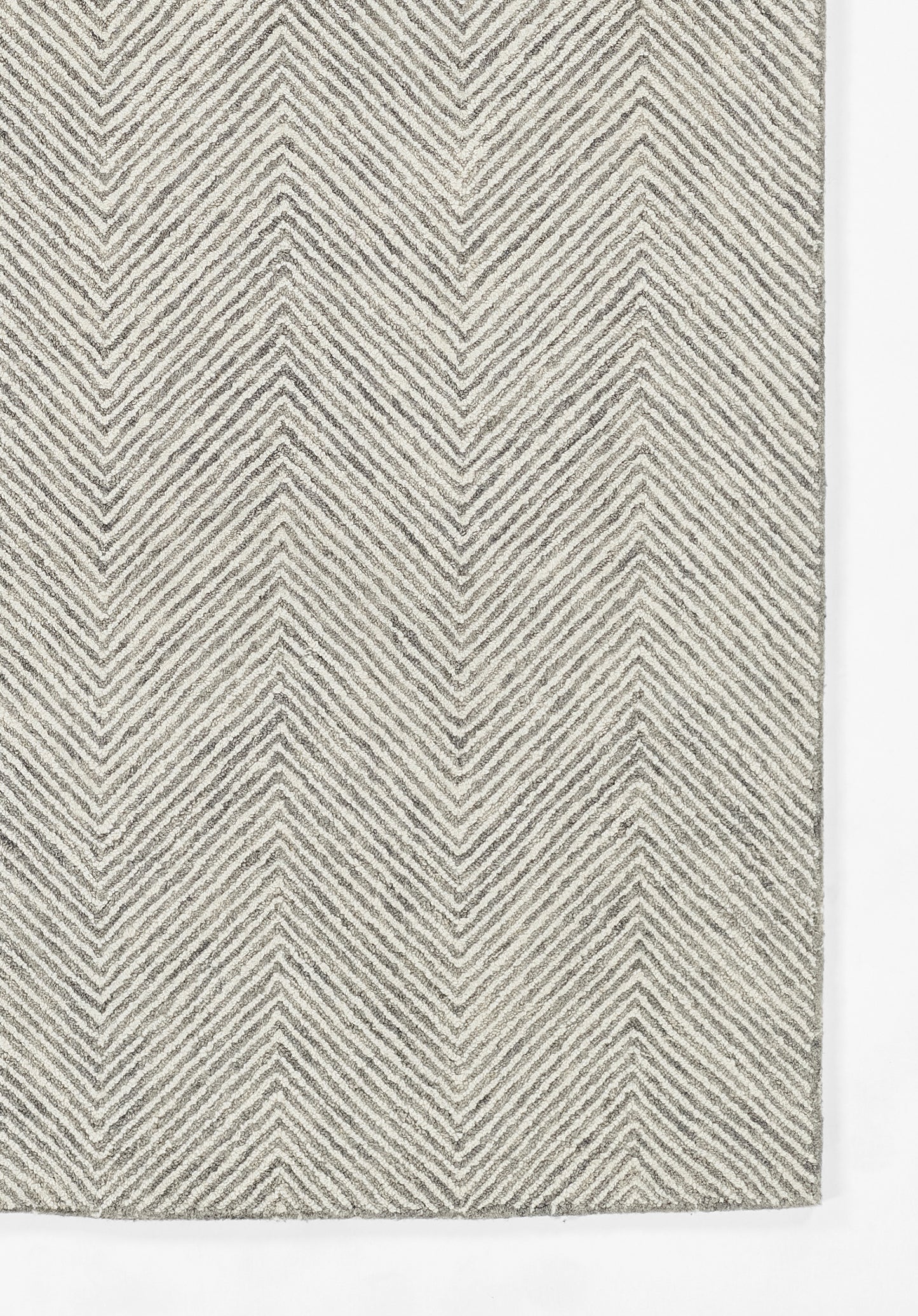 Textured gray and beige chevron woven rug, rectangular, modern geometric style for living room or entryway.