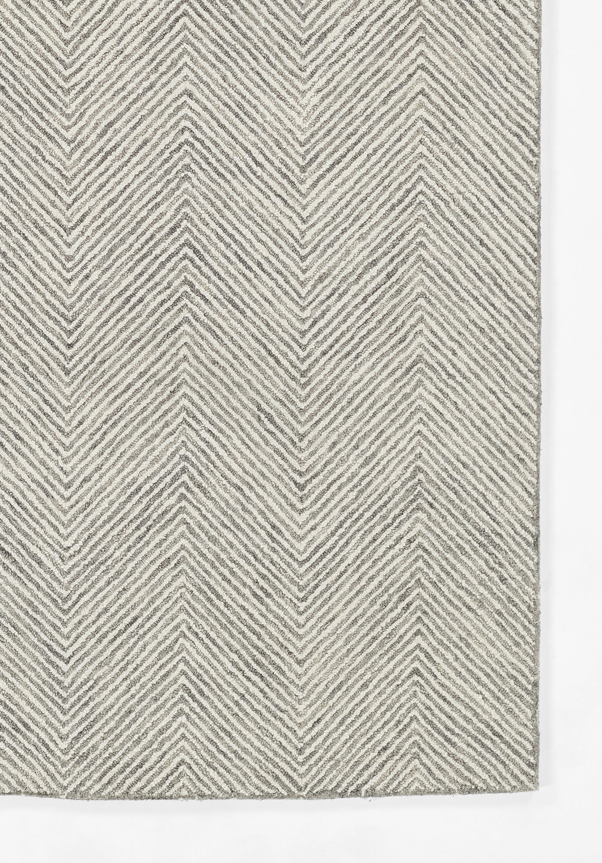 Textured gray and beige chevron woven rug, rectangular, modern geometric style for living room or entryway.