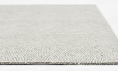 Light gray chevron-pattern rug, woven fabric, rectangular, modern style for living room or hallway.