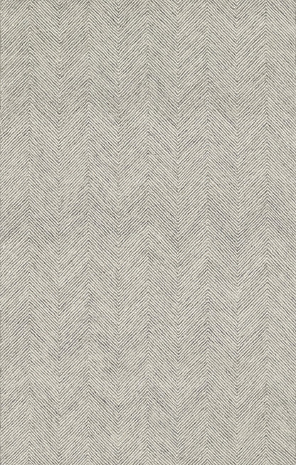 Gray herringbone rug with textured woven chevron pattern in neutral tones.
