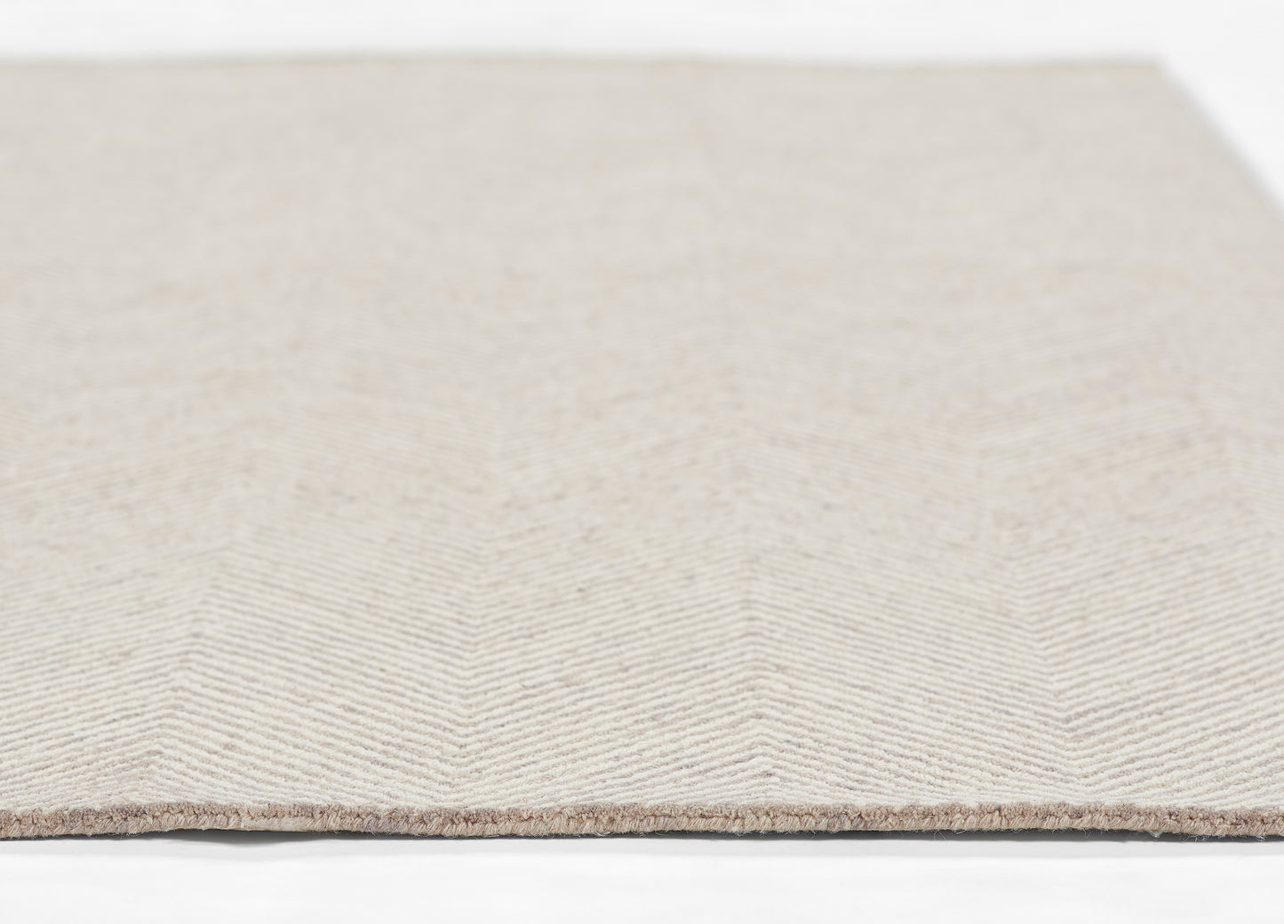Taupe beige runner rug with a subtle herringbone pattern and a fringed edge, 2'3" x 8'.