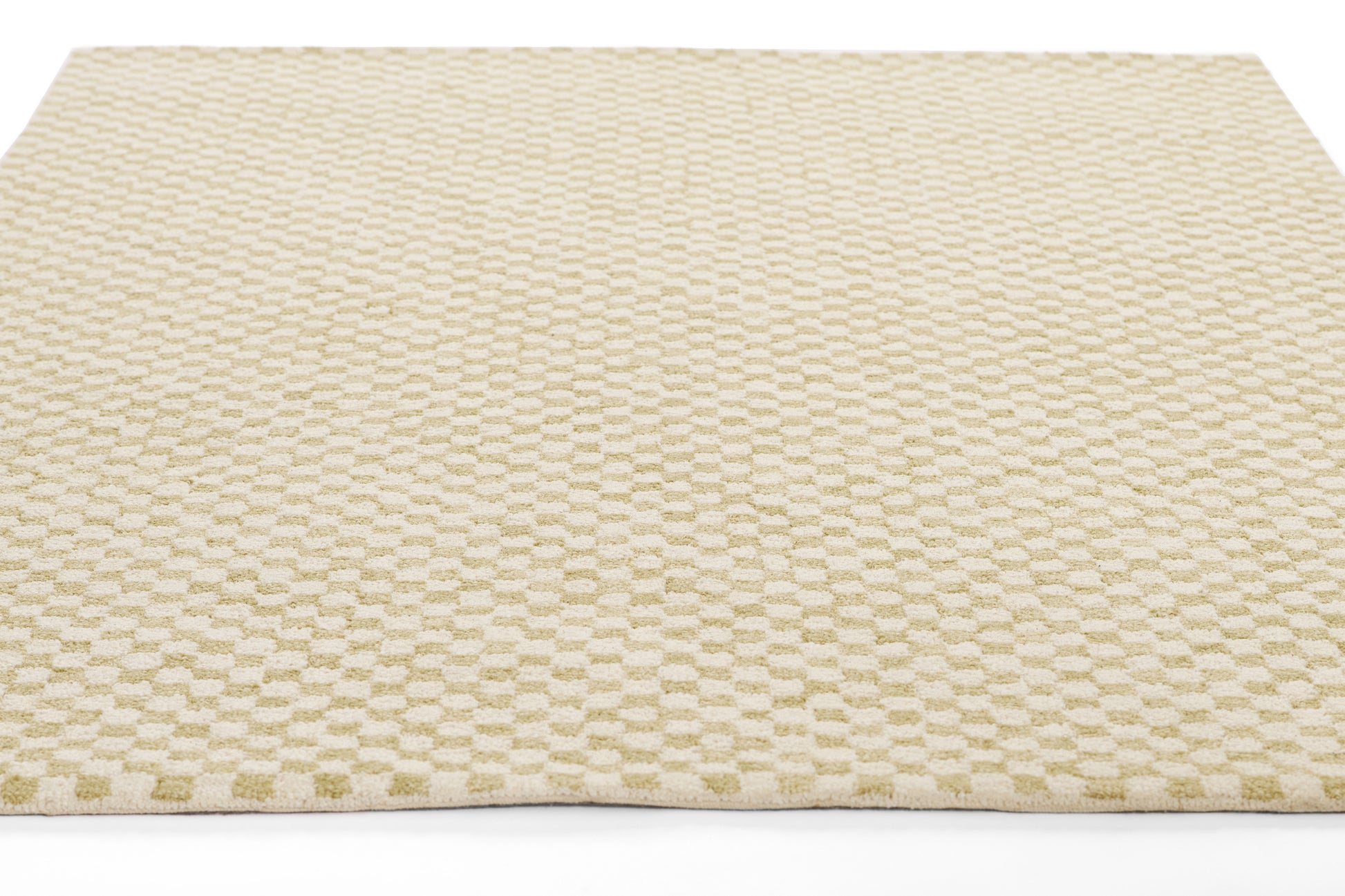 Beige textured area rug with a subtle cream-tan honeycomb pattern; low-pile, woven look.