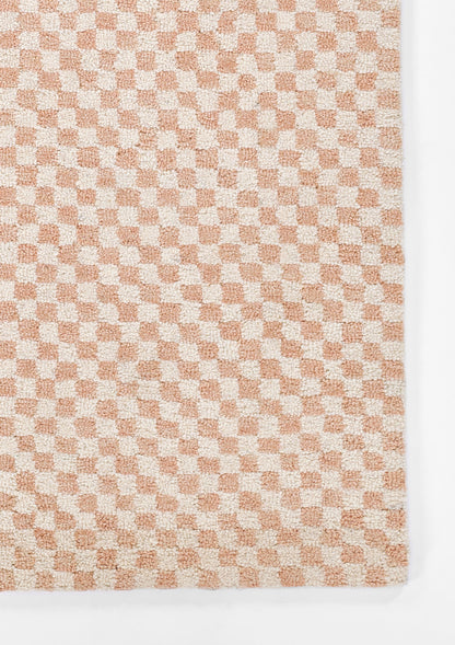 Peach and ivory checkered rug runner with a soft, looped texture, 2'3" X 8'.