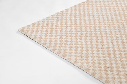 Beige & cream rug with tiny diamond geometric pattern; soft plush texture, corner visible.