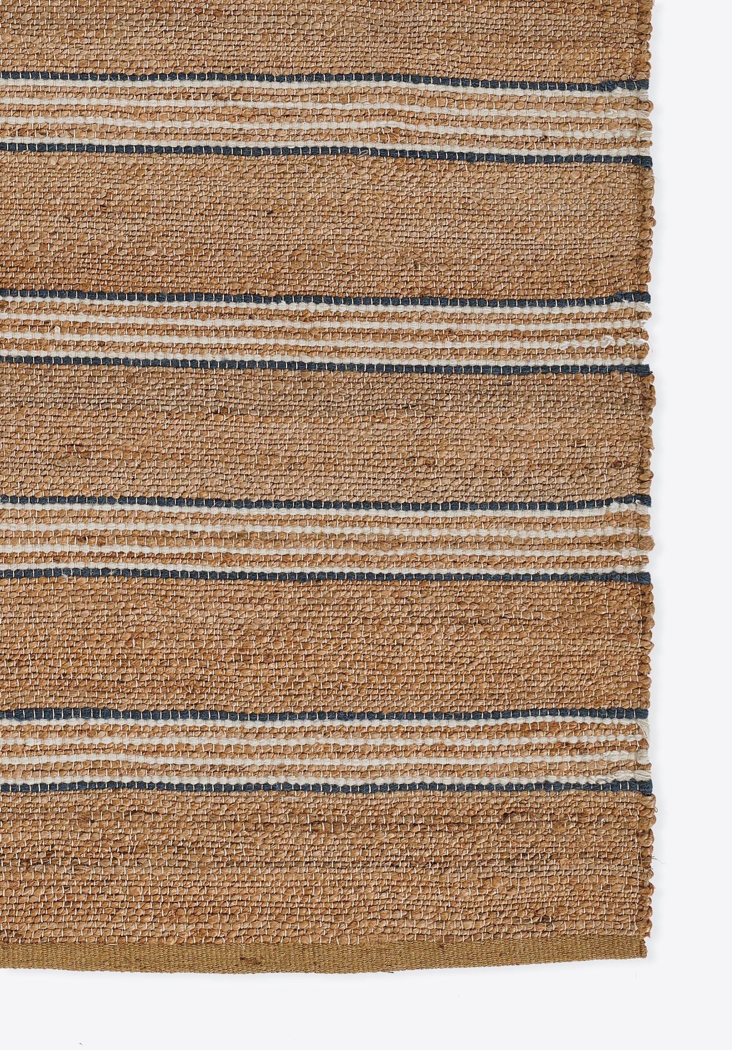 Natural jute rug with blue and white horizontal stripes; textured woven surface.