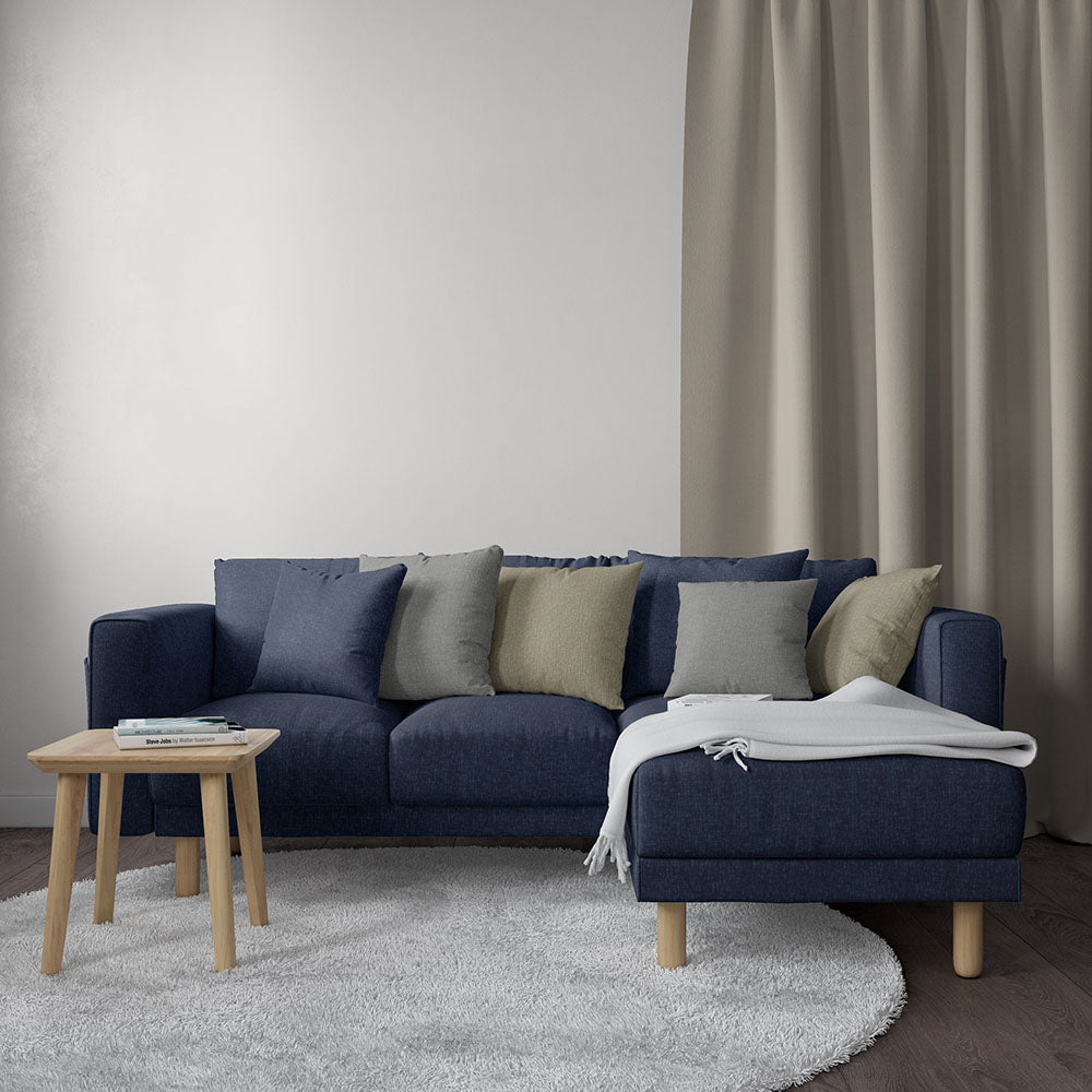 Indigo solid upholstery fabric swatch with woven texture.