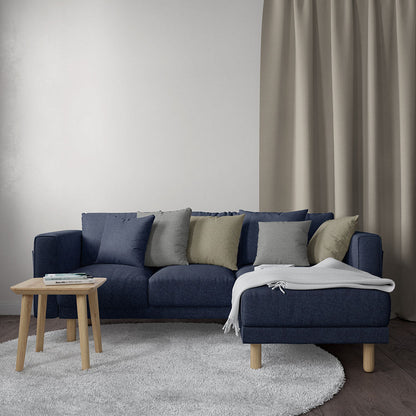 Indigo solid upholstery fabric swatch with woven texture.