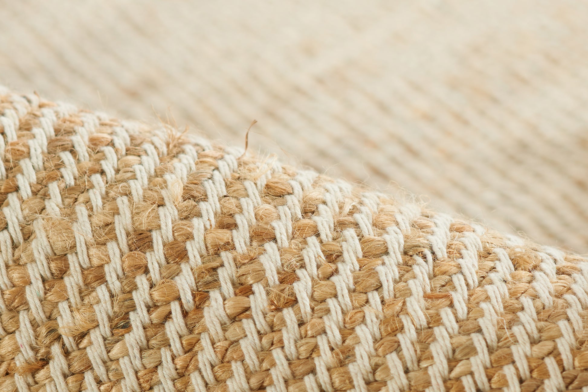Natural jute & white yarn weave in beige & white stripes; chunky textured rustic rug look.