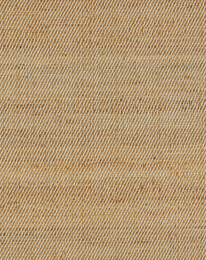 Beige and cream diagonal twill fabric texture, natural cotton look.