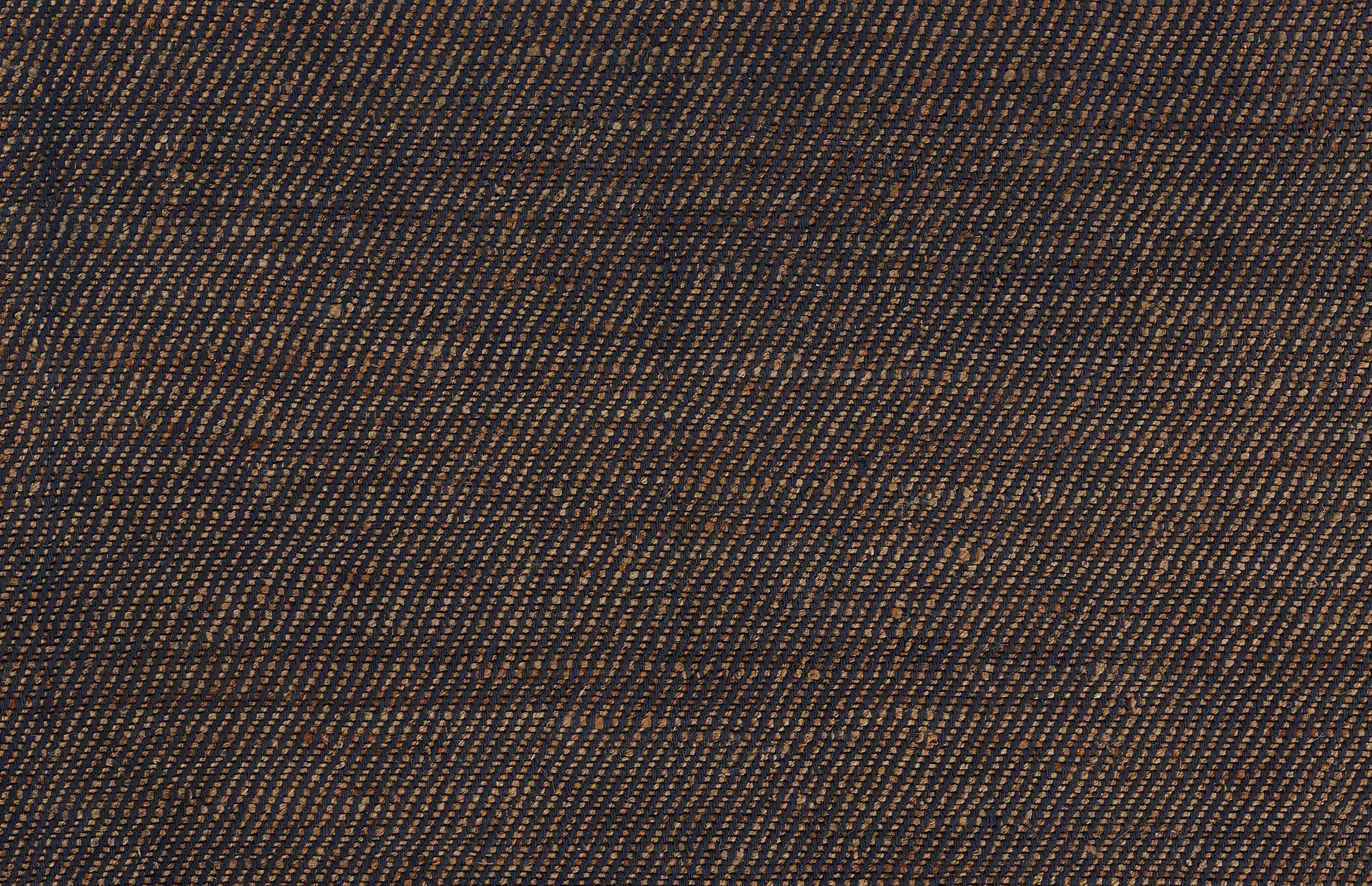 Dark blue rug close-up with denim twill diagonal weave.
