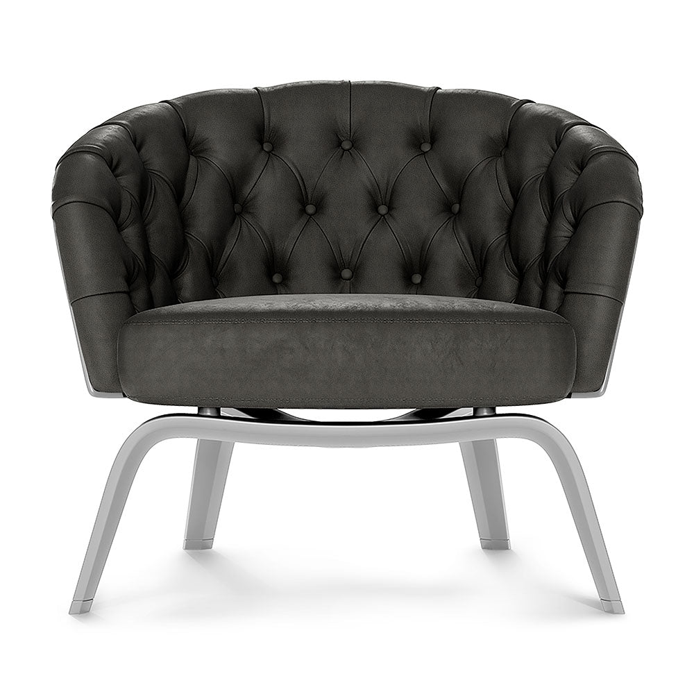 Charcoal solid fabric lounge chair with rounded back, buttoned upholstery & silver metal sled legs