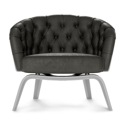 Charcoal solid fabric lounge chair with rounded back, buttoned upholstery & silver metal sled legs