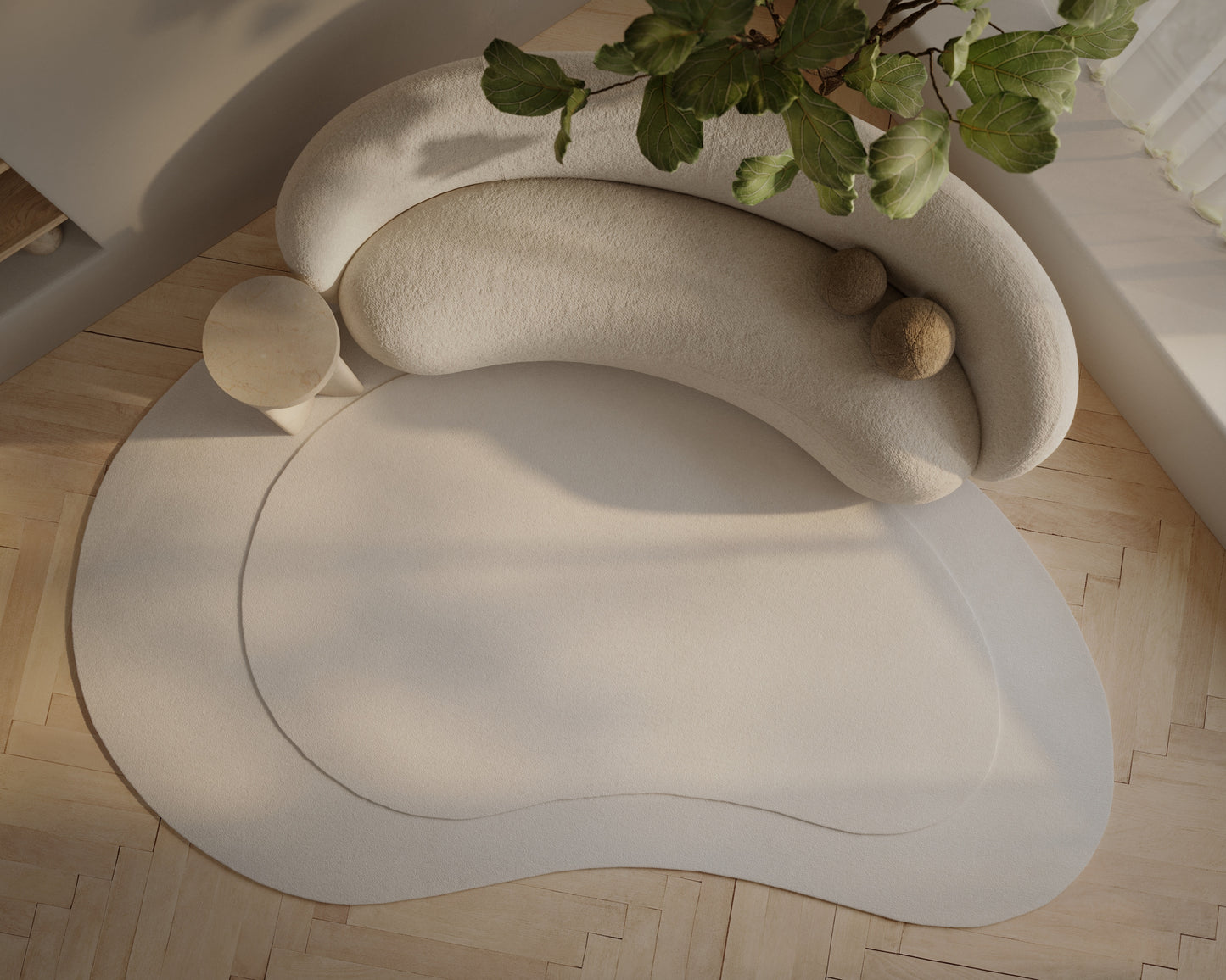 Ivory curved modular sofa with soft fabric and pebble cushions, placed on a circular beige rug in a sunlit room.