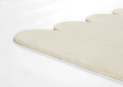 Beige rug with soft plush pile.