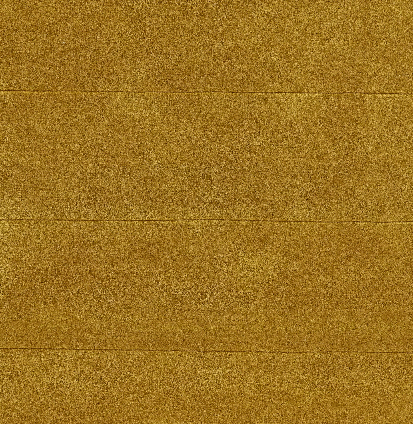 Golden-brown rug runner with a subtle pattern and textured pile, 3' x 8'.