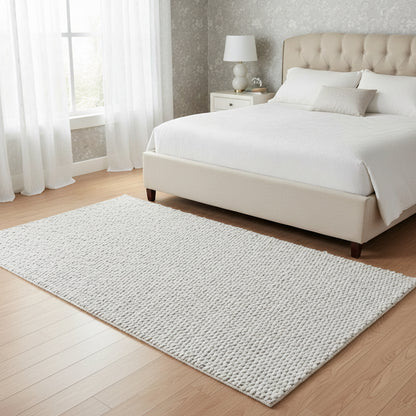 8' x 10' area rug with cloud motif in casual style.