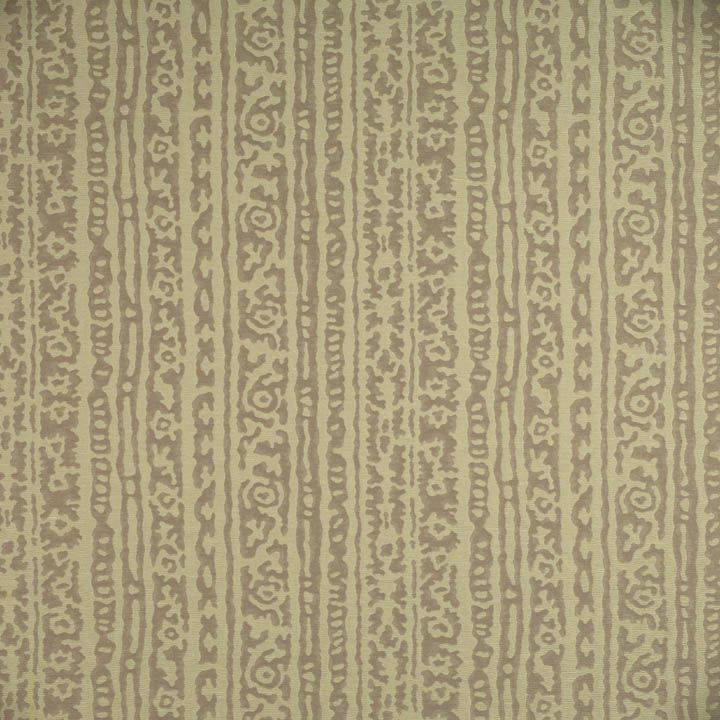 Beige woven fabric with vertical brown ornamental stripes and circular motifs; upholstery or drapery textile.