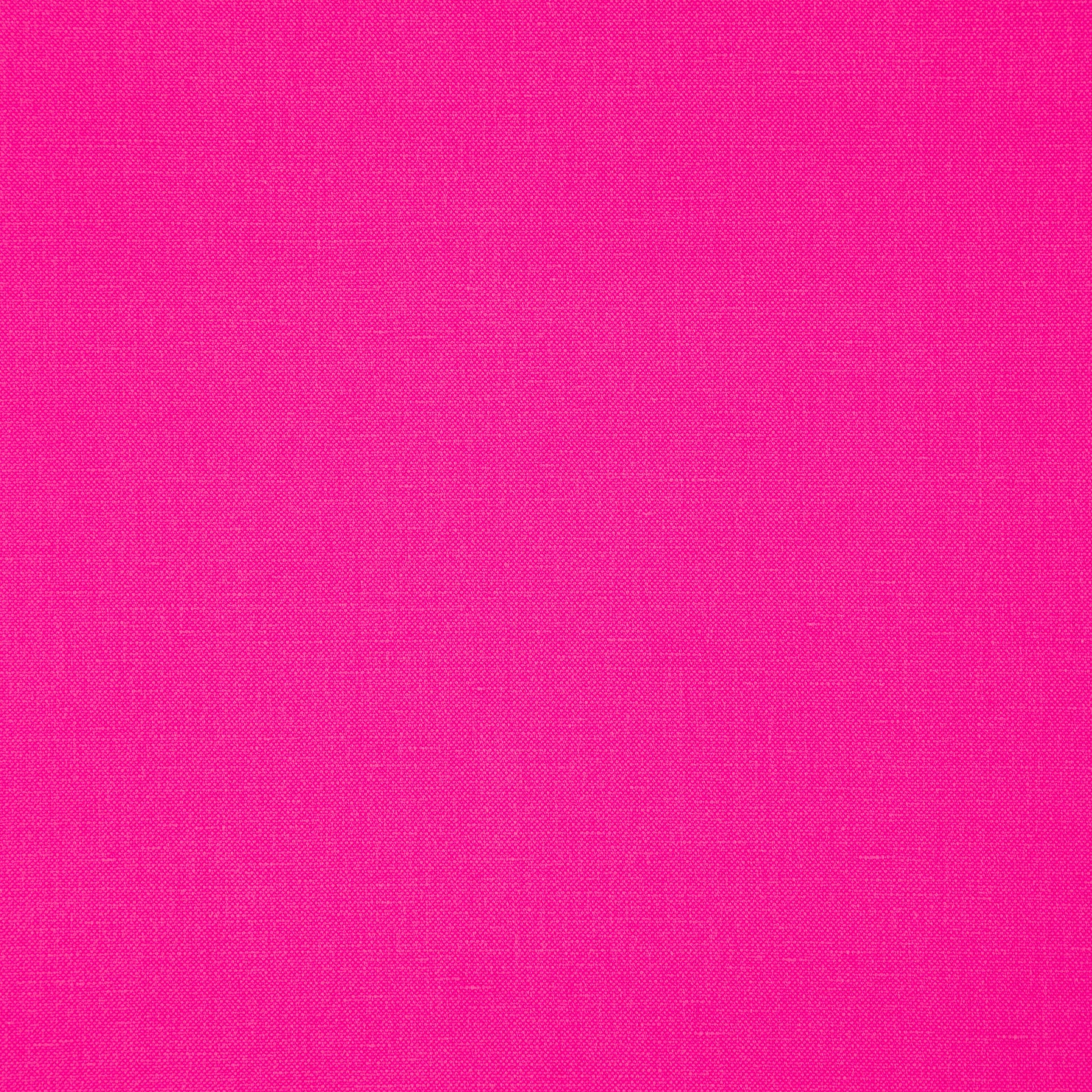 Bright pink fabric swatch with subtle woven texture, close-up.