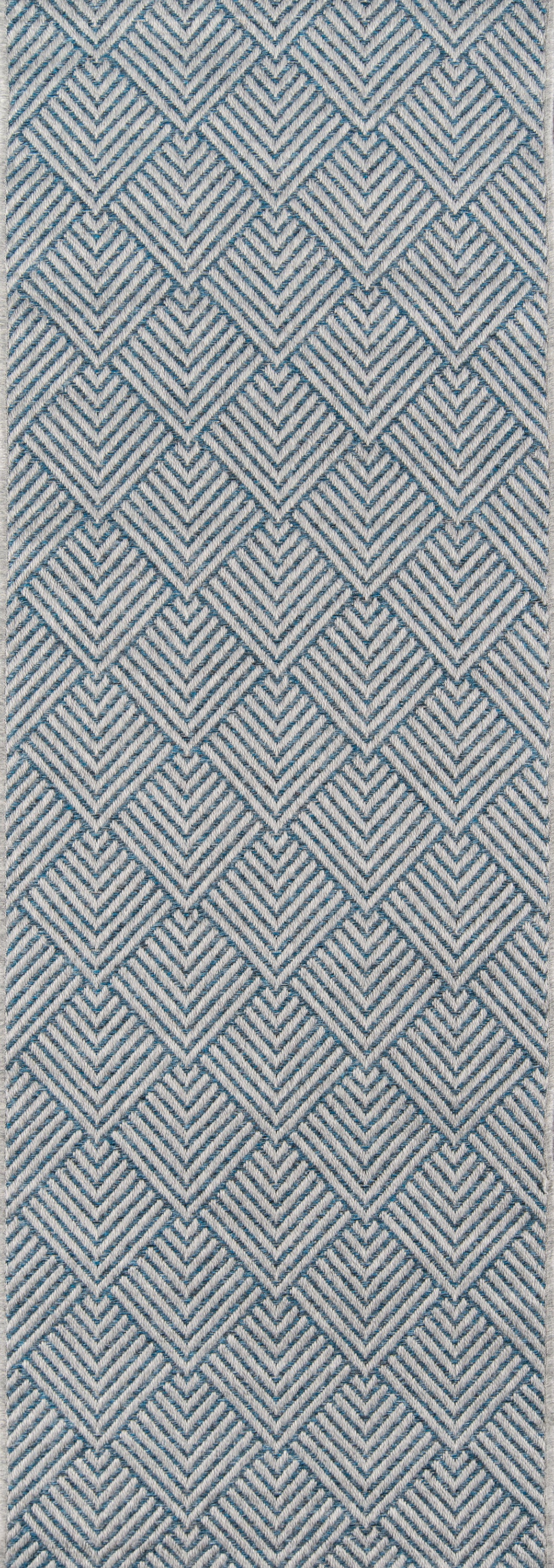 Blue and white chevron diamond pattern rug; geometric woven textile for home decor.