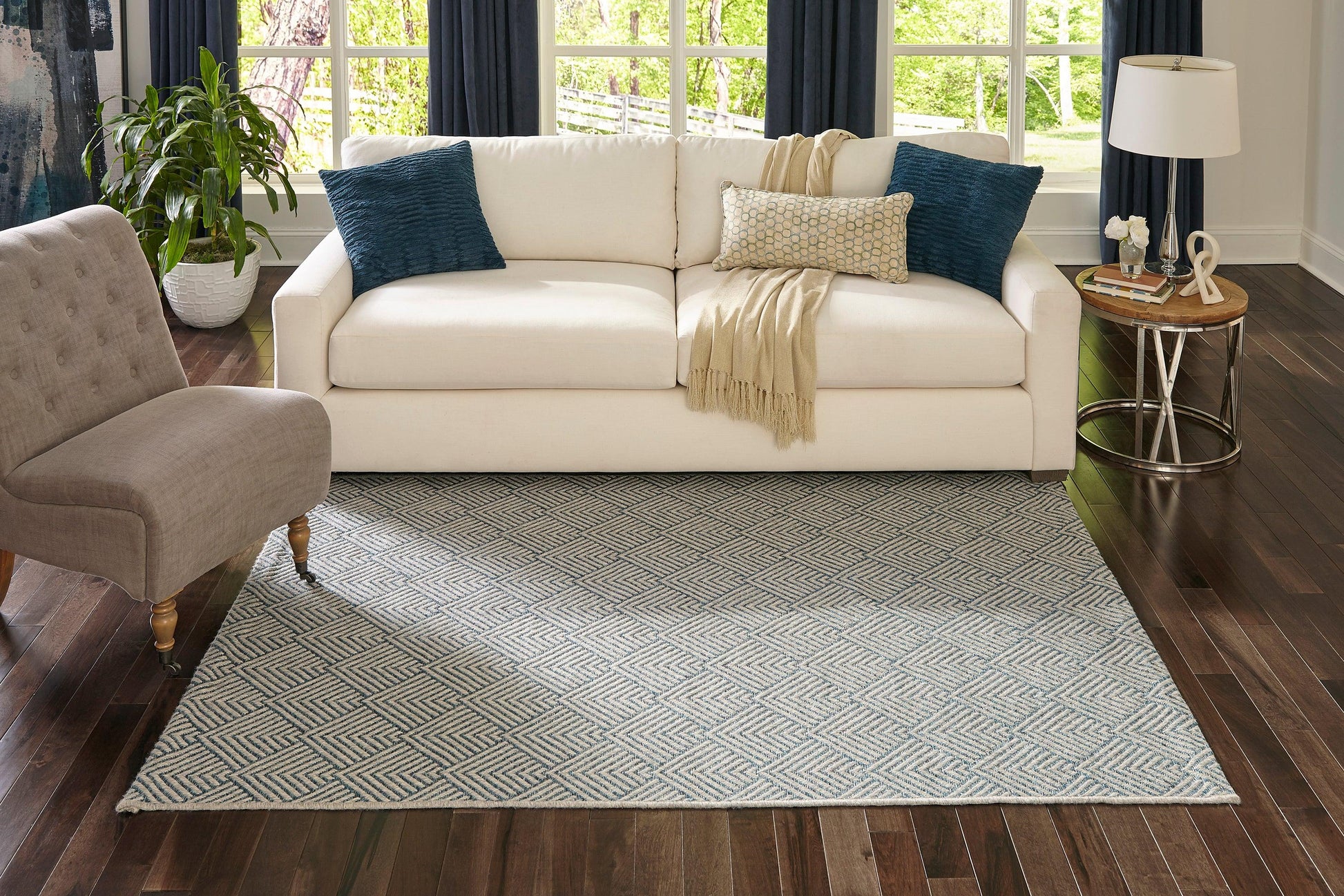 Cream 3' x 8' rug runner with a geometric pattern on dark wood floors.