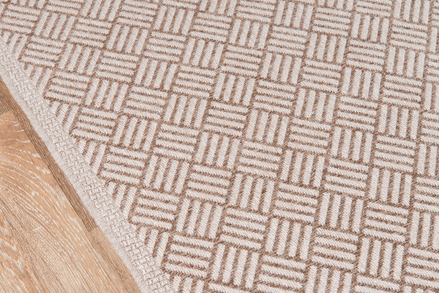Tan and beige geometric checkerboard rug, woven flatweave with textured square motifs.