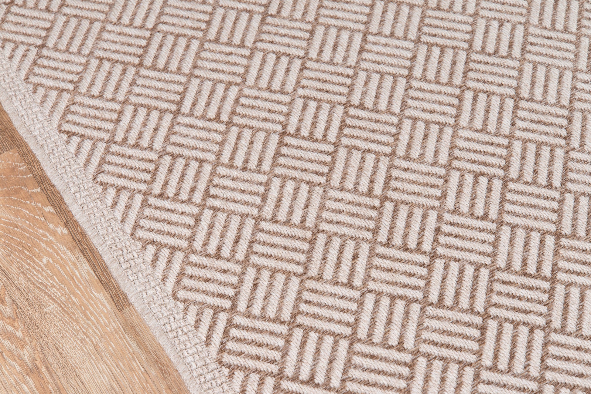Tan and beige geometric checkerboard rug, woven flatweave with textured square motifs.