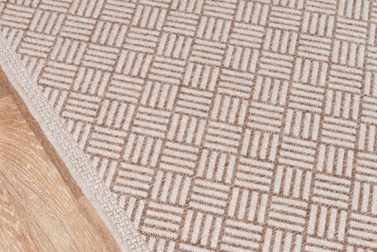 Tan and beige geometric checkerboard rug, woven flatweave with textured square motifs.