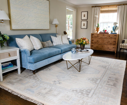 Cream geometric rug, 6' x 9'.