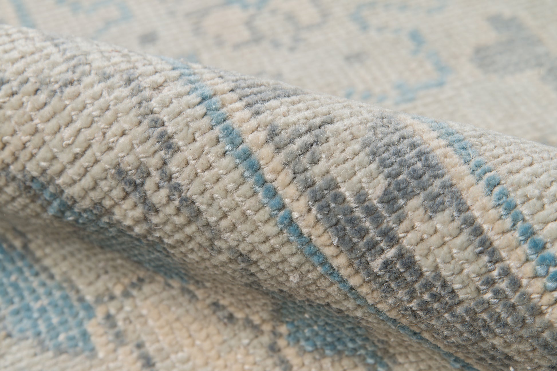 Ivory & blue rug with gray accents; plush woven pile and geometric pattern for living room decor.
