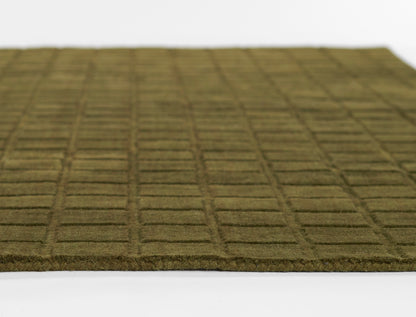 Olive-green doormat with raised square grid pattern and textured fibrous surface.