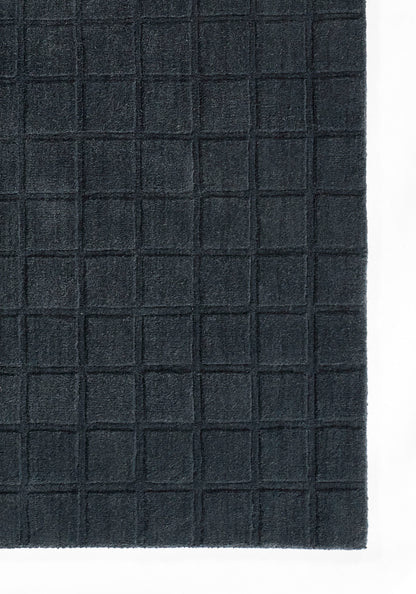 Navy blue plush rug runner with an embossed square grid pattern, 2'3" x 8'.