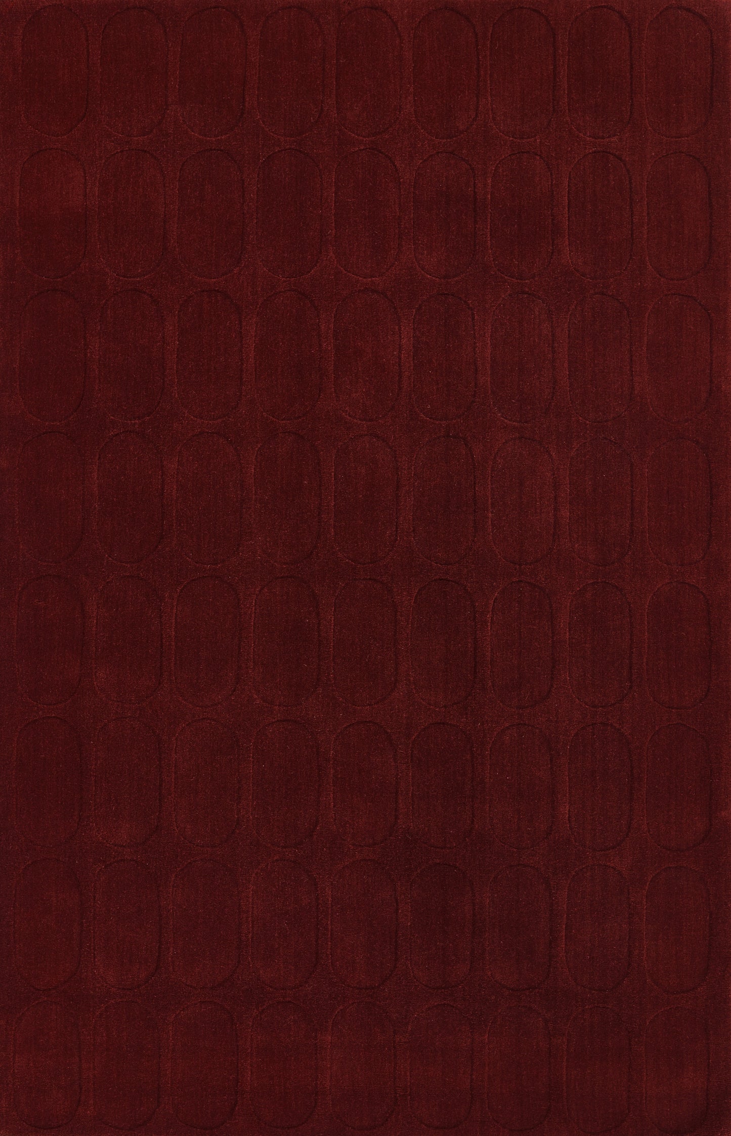 Dark burgundy rug with a leather-like texture and a repeating embossed oval pattern; 2' x 3'.