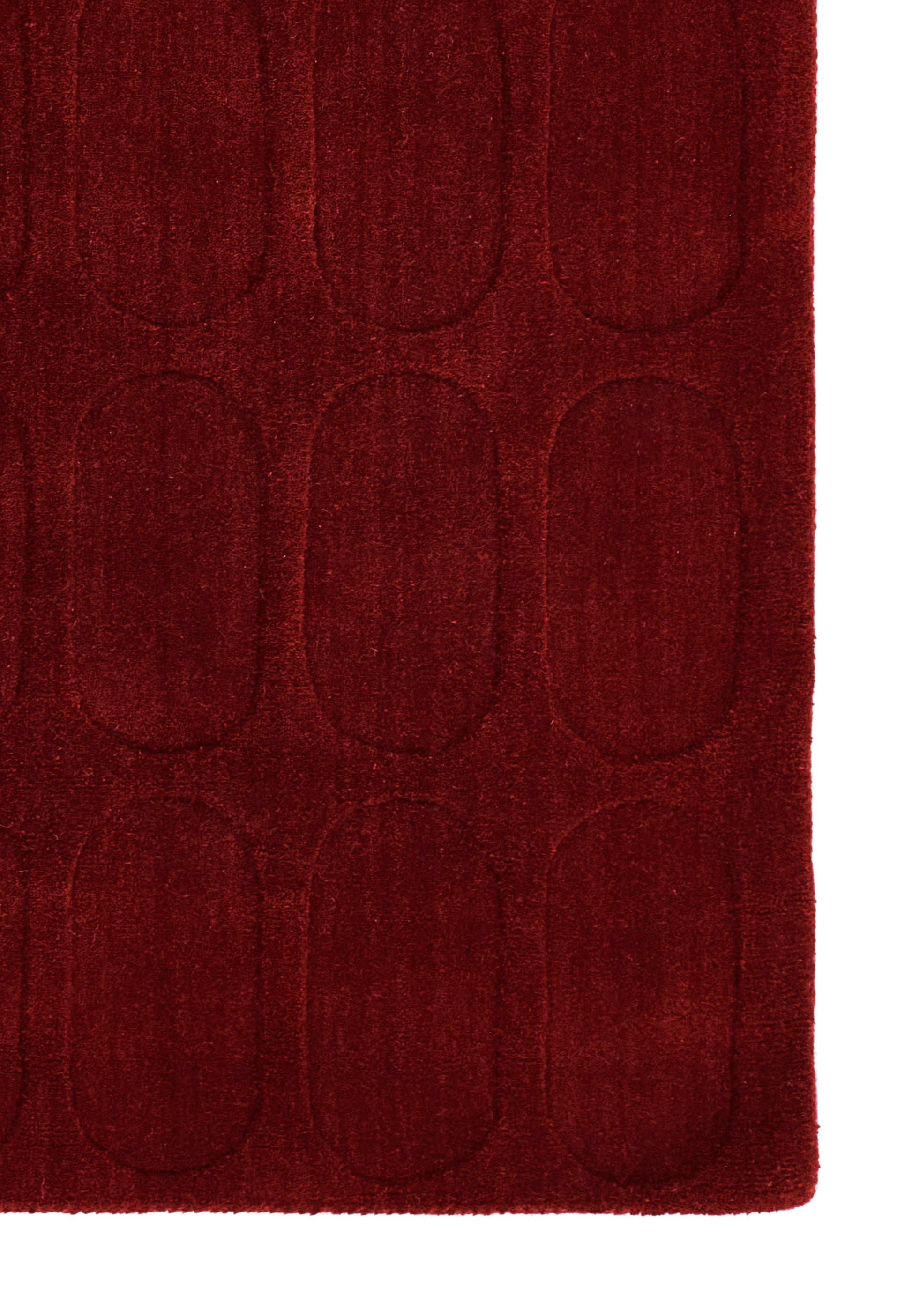 Burgundy rectangular rug with an embossed oval pattern and plush texture, 5' x 8'.