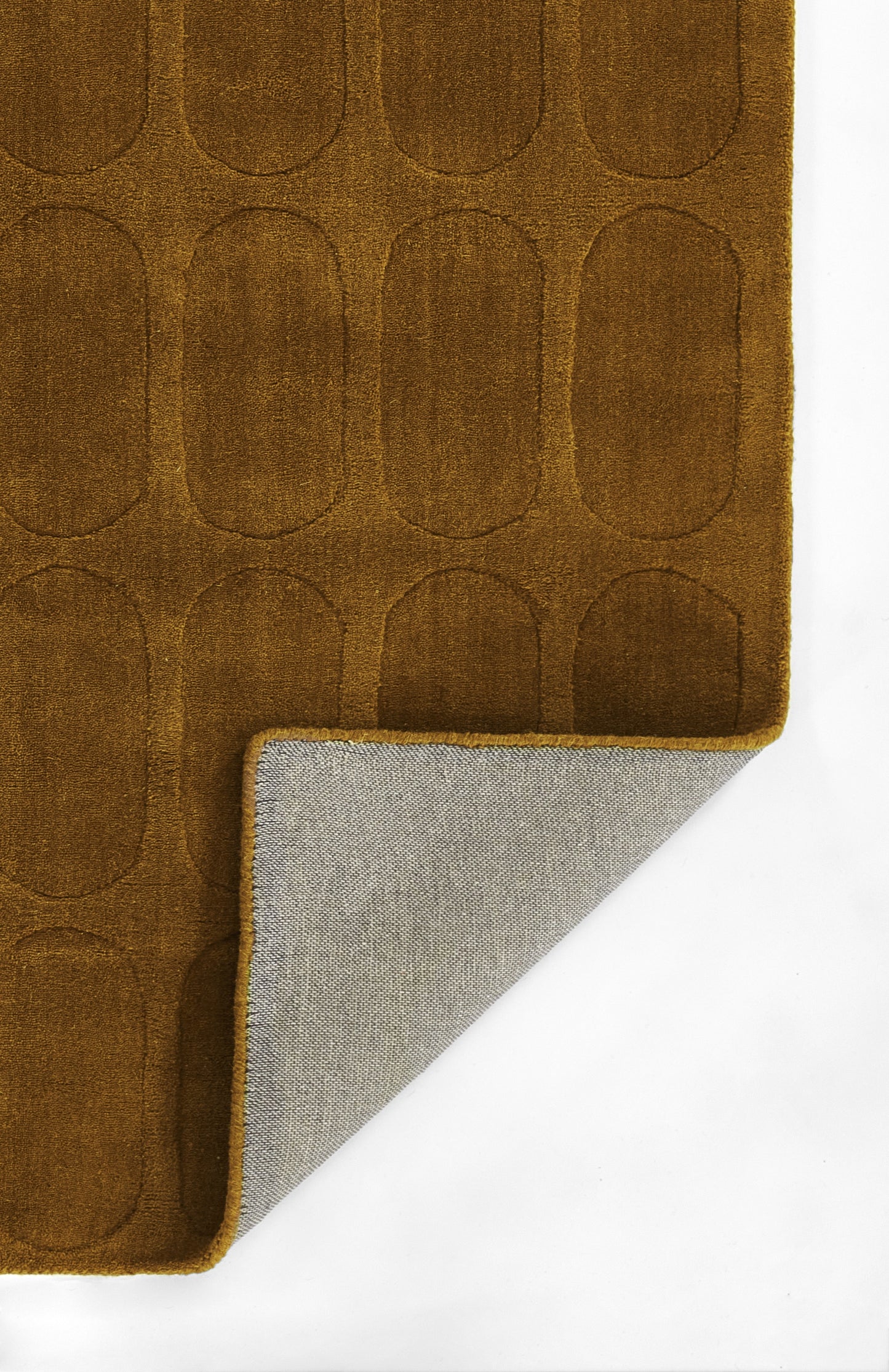 Brown rug with repeating rounded-oval embossed pattern; folded corner reveals gray underside.