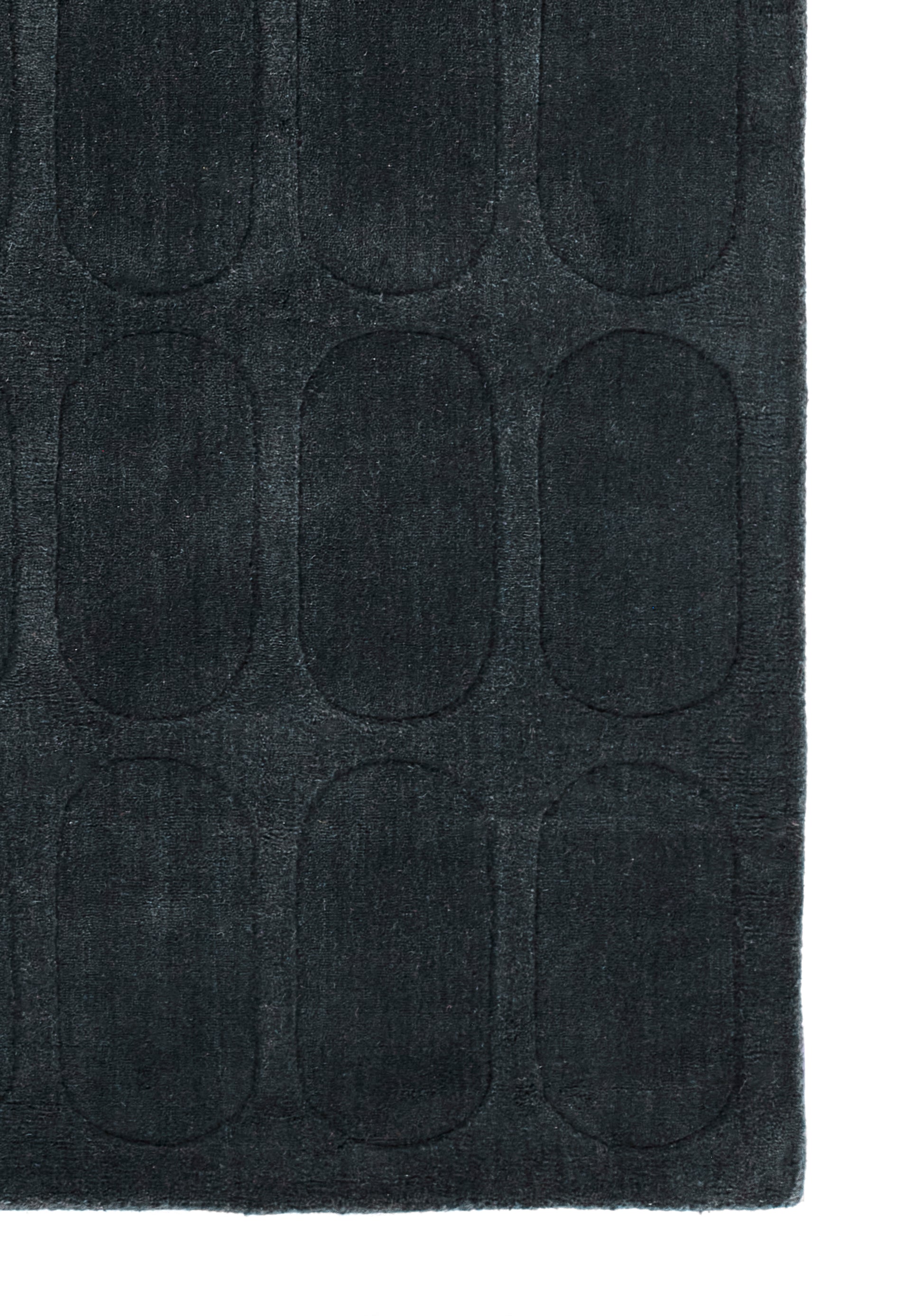Dark navy rectangular microfiber mat with a raised rounded-rectangle grid pattern for a plush, modern look.