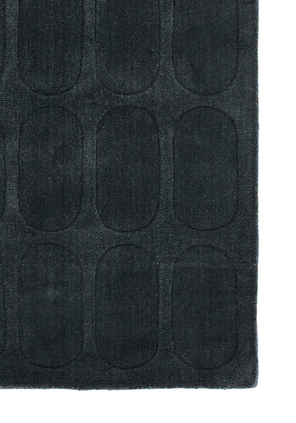 Dark navy rectangular microfiber mat with a raised rounded-rectangle grid pattern for a plush, modern look.