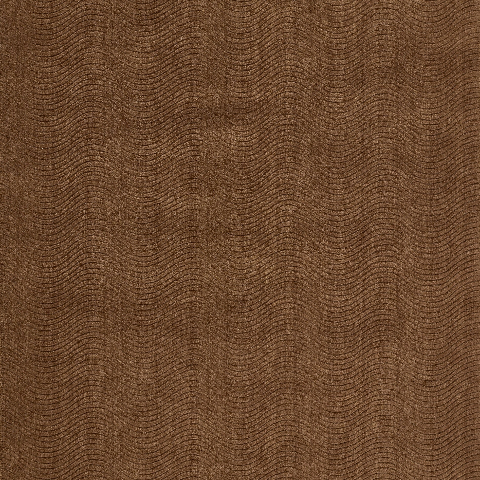 Warm brown rug with subtle texture and a wavy pattern, size 7'10" x 10'.