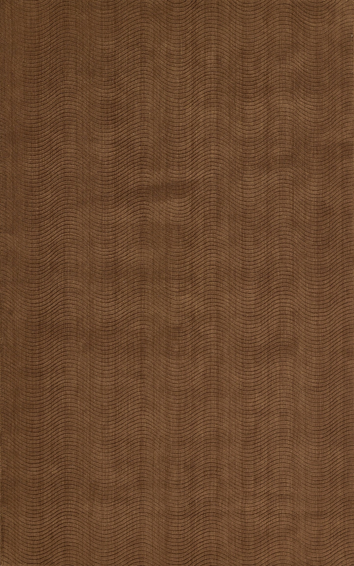 Brown corduroy fabric with soft vertical ridges; warm tan textile for clothing or upholstery.
