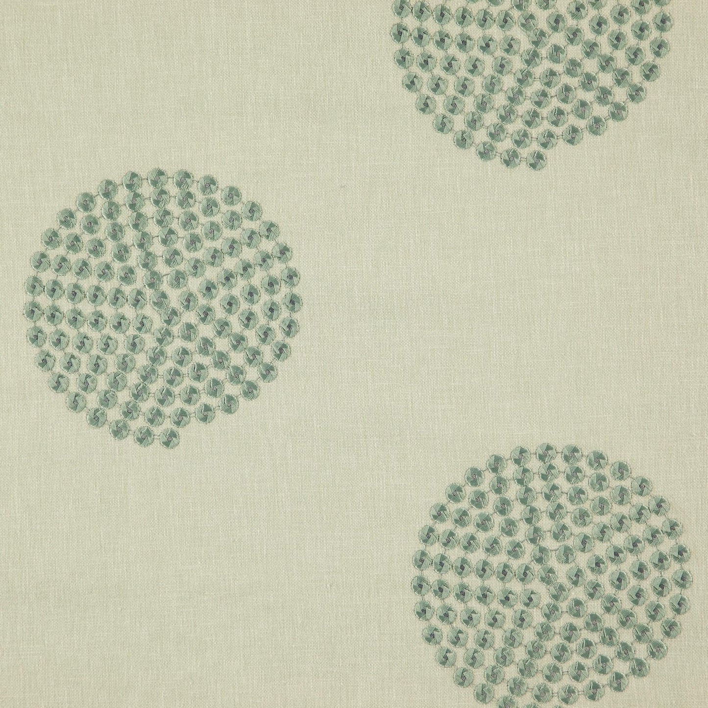 Fabric with geometric green embroidery texture; upholstery material.